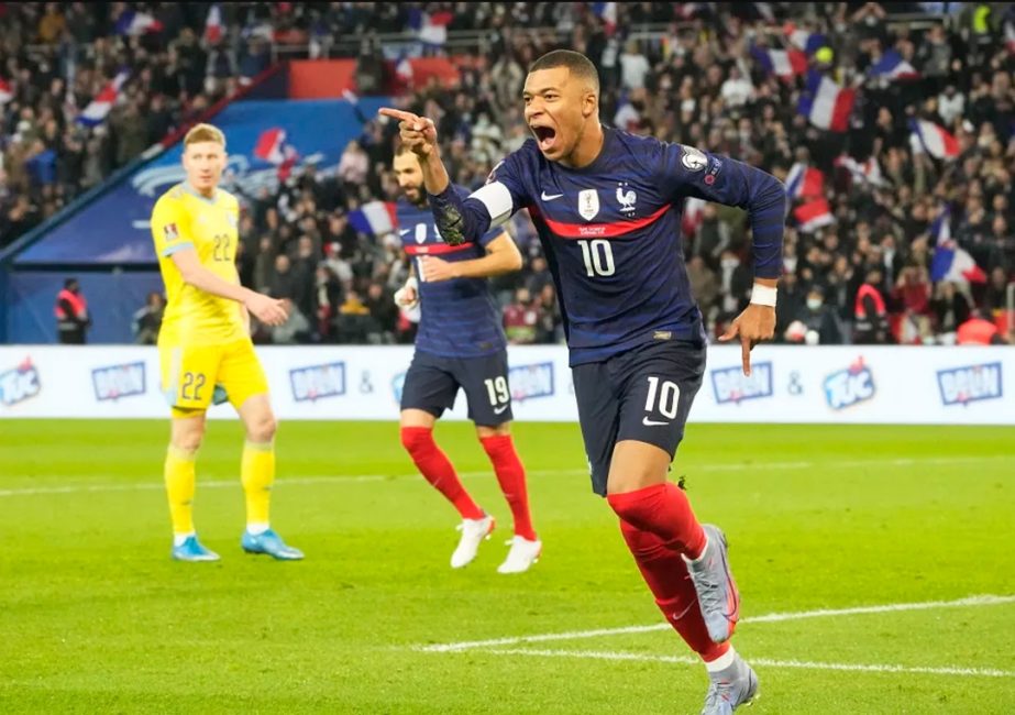 France's Kylian Mbappe (right) celebrates after scoring his side's second goal during the World Cup 2022 group D qualifying soccer match between France and Kazakhstan at the Parc des Princes stadium in Paris, France on Saturday. AP photo