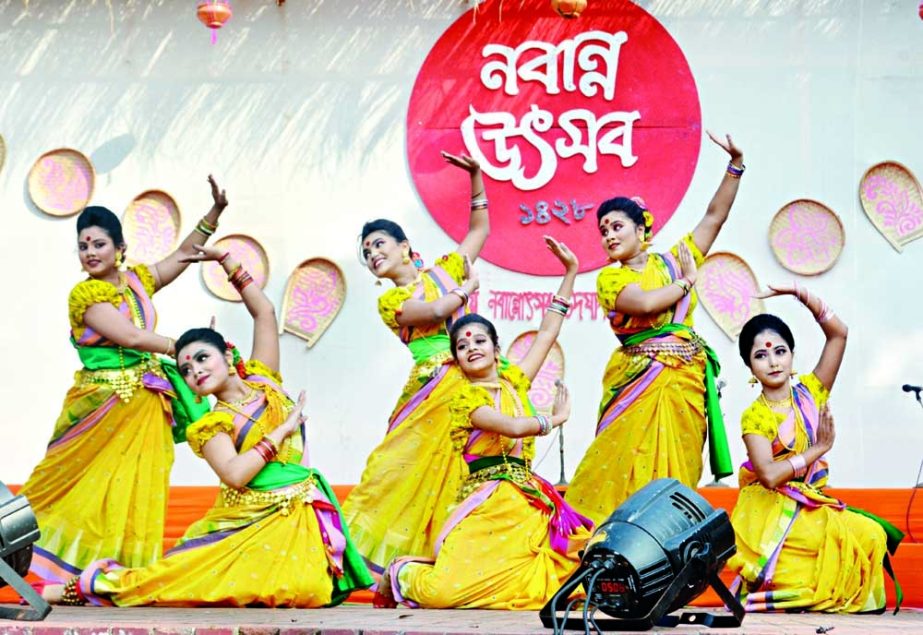 Artistes perform a dance number at the Nabanna Festival event at the Shilpakala Academy in Dhaka on Tuesday. NN photo