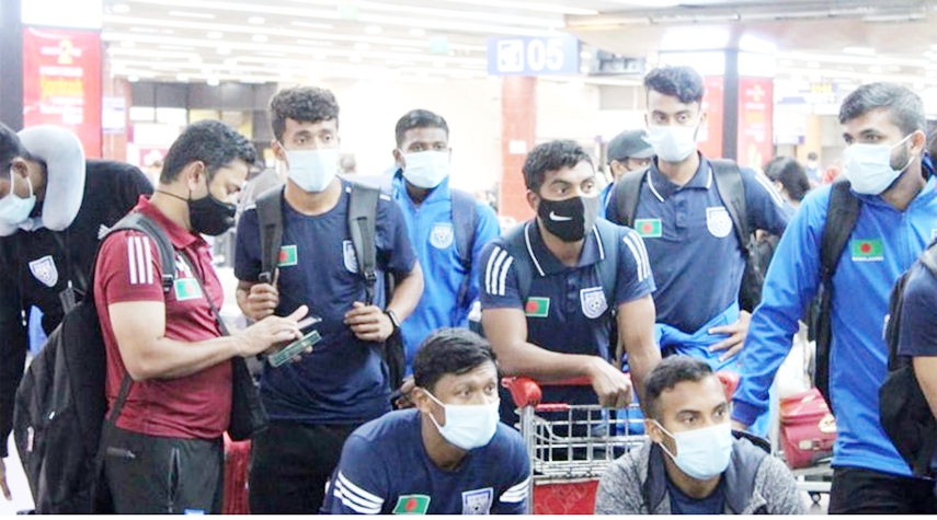 Members of Bangladesh Football team reach the Hazrat Shahjajal International Airport on Thursday.