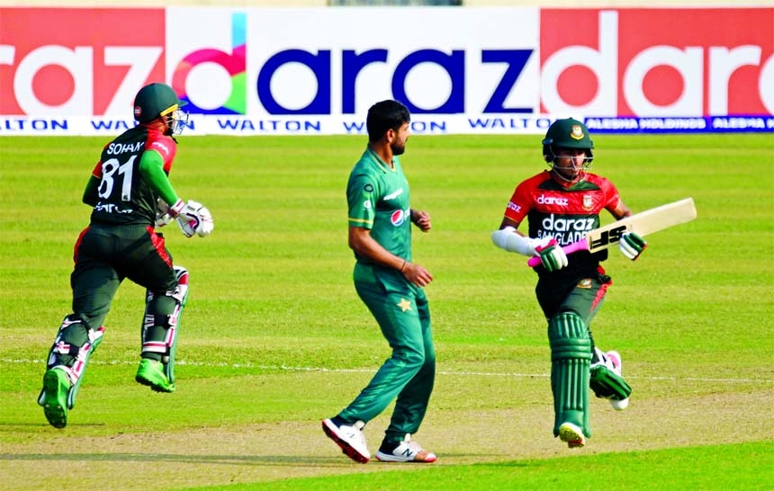 Nurul Hasan Sohan (left) and Afif Hossain (right) running between the wickets during the first Twenty20 International match against Pakistan, at the Sher-e-Bangla National Cricket Stadium in the city's Mirrpur on Friday.