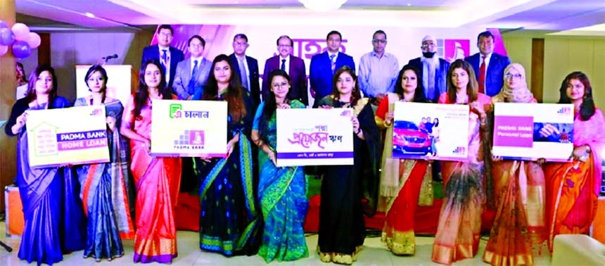 Md Ehsan Khasru, Managing Director of Padma Bank Limited, poses for a photograph along with guests after launching 'Padma-Proyojon' loan scheme at the BGB Hall of Dhanmondi in the capital on Saturday.