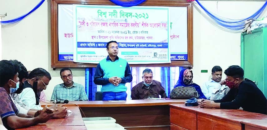 CHATMOHOR (Pabna): A A Masum Billah, Chatmohor Upazila Agriculture Officer speaks as the Chief Guest at a discussion meeting on role of citizens to protect river and environment marking the World River Day at the Upazila Agriculture Office on Sunday.