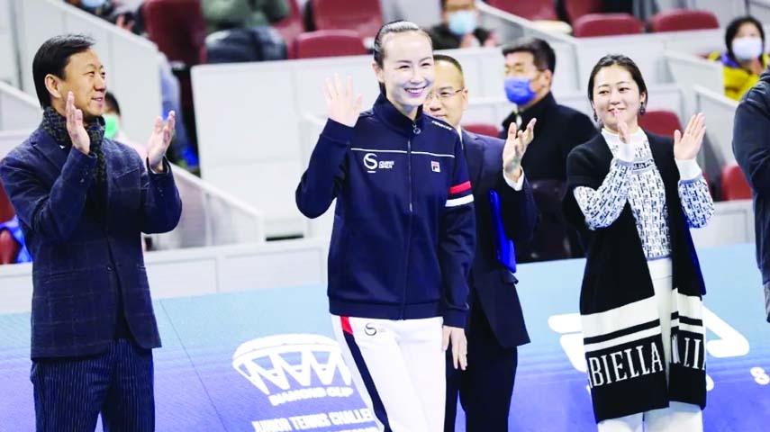 Peng Shuai (left) purportedly attended a junior tennis tournament in Beijing on Sunday.