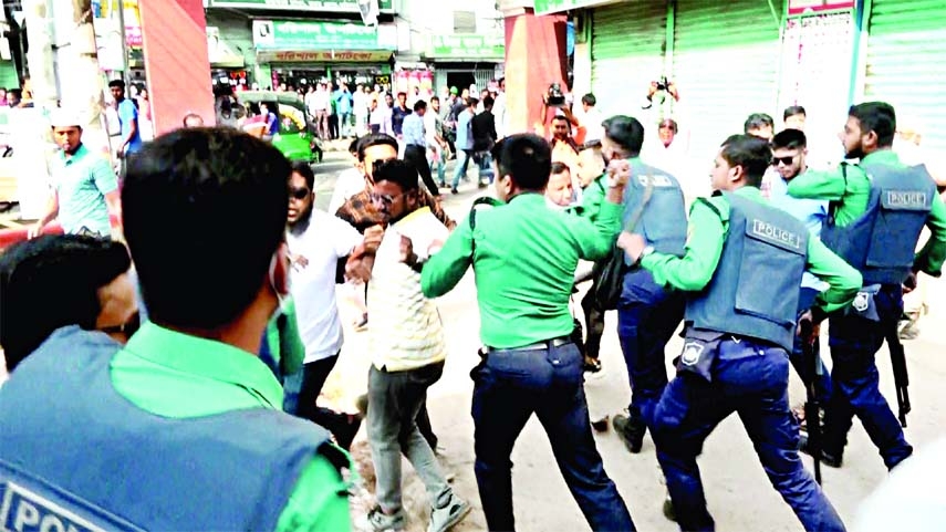 Police charge batons on supporters of BNP in Barishal city on Monday when they assembled as part of their central program demanding its chairperson Khaleda Zia's release for her treatment abroad.