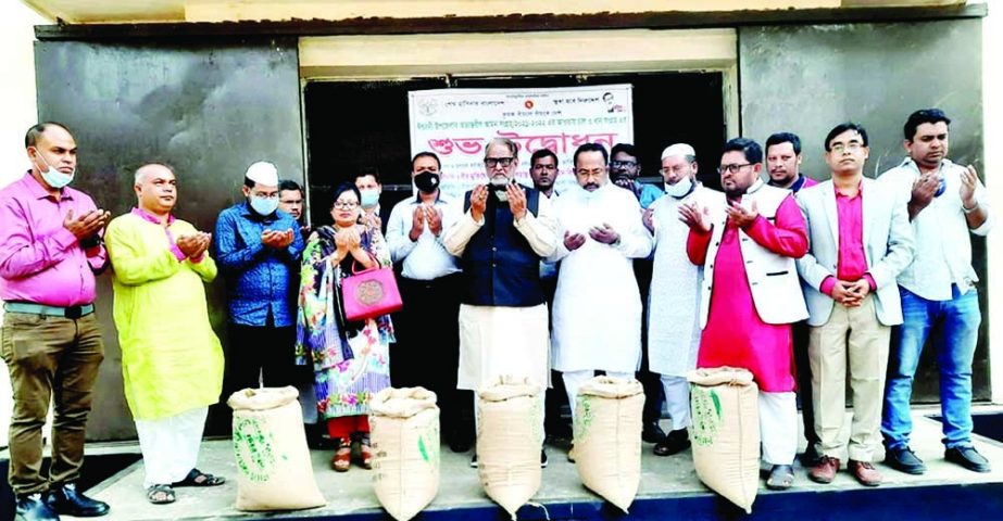 ISHWARDI (Pabna): Alhaj Nuruzzaman Biswas MP with others offered Munajat at the inaugural Aman paddy and rice procurement programme in the Ishwardi upazila hall on Tuesday. NN photo