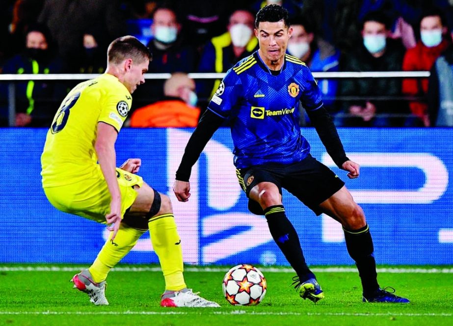 Manchester United's Cristiano Ronaldo (left) in action with Villarreal's Juan Foyth at La Ceramica stadium in Vila-real on Tuesday. Agency photo