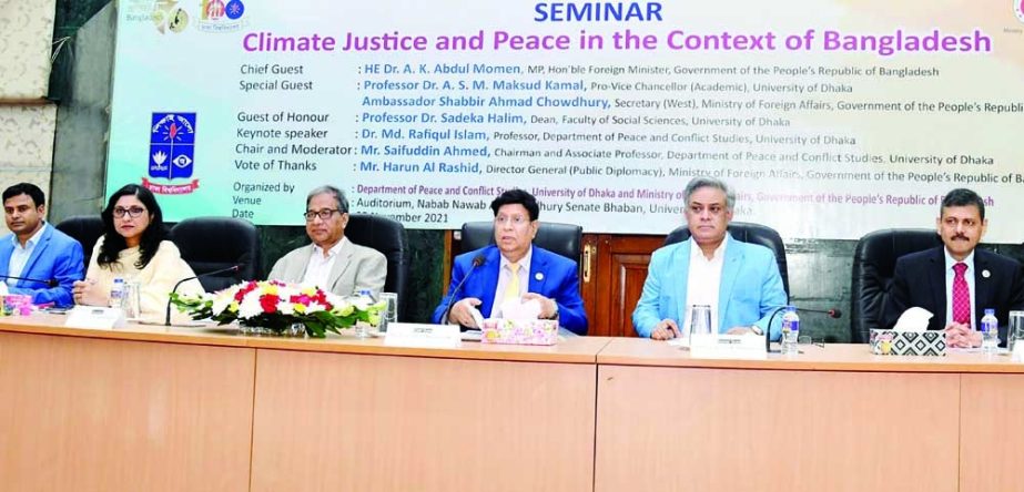 Foreign Minister Dr. AK Abdul Momen speaks at a seminar on 'Climate Justice and Peace in the Context of Bangladesh' at Nabab Nawab Ali Chowdhury Senate Bhaban of Dhaka University on Thursday. NN photo