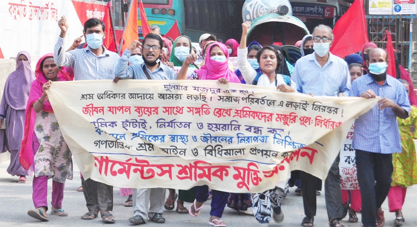 Garments Sramik Mukti Andolon brings out a procession in the city's Topkhana Road on Friday with a call to refix wages of employees.
