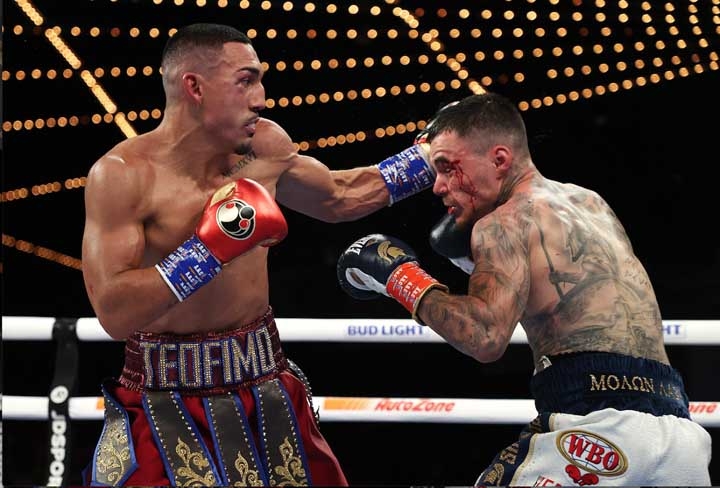 Teofimo Lopez (left) punches George Kambosos during their championship bout for Lopez's Undisputed Lightweight title at The Hulu Theater in Madison Square Garden, New York on Saturday. Agency photo