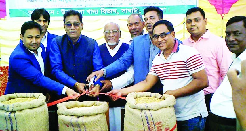 SAGHATA (Gaibandha) : Jahangir Kabir, Chairman, Saghata Upazila Parishad inaugurateds Aman paddy procurement work at Bonarpara on Wednesday.