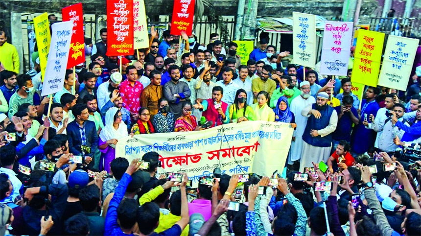 Nurul Haque Nur, member secretary of Gono Odhikar Parishad, speaks at programme in front of the Jatiya Press Club on Friday, demanding road safety, half bus fare for students and fuel price cut.