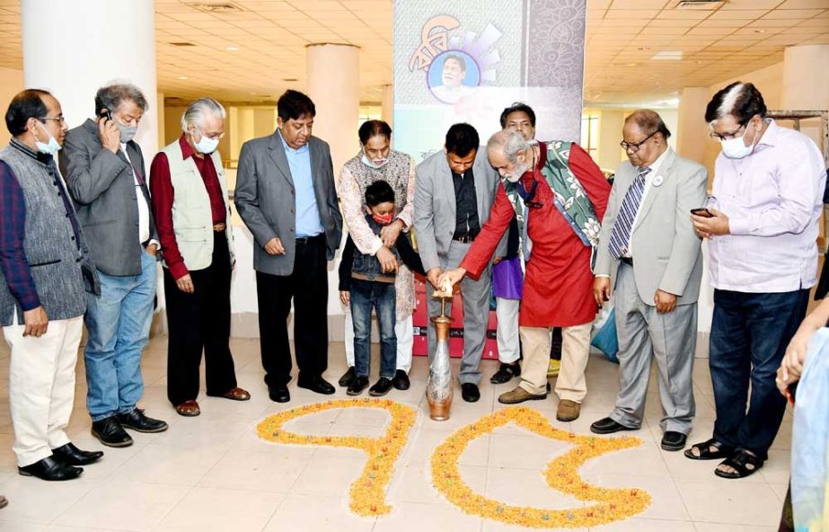 Information and Broadcasting Secretary Mokbul Hossain inaugurates 75 solo artworks show at Shilpakala Academy in the city on Saturday marking the 75th birth anniversary of Poet and Artist Rabiul Haque. NN photo