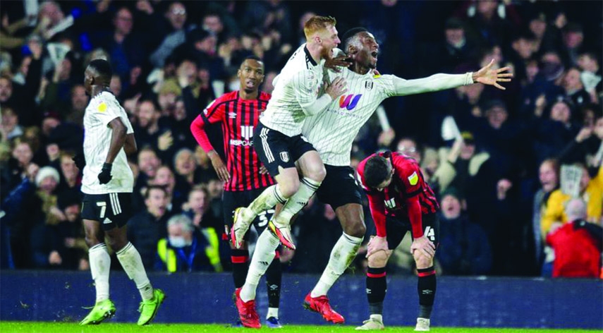 Tosin Adarabioyo (left) celebrates his late equaliser for Fulham against Bournemouth on Friday.
