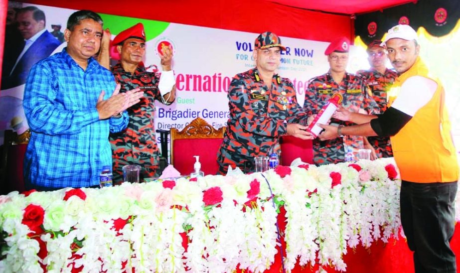 DG of FSCD Brig. Gen. Sazzad Hossain, ndc, among others, at a discussion and raffle draw on the occasion of International Volunteers Day in FSCD auditorium in the city on Sunday. NN photo