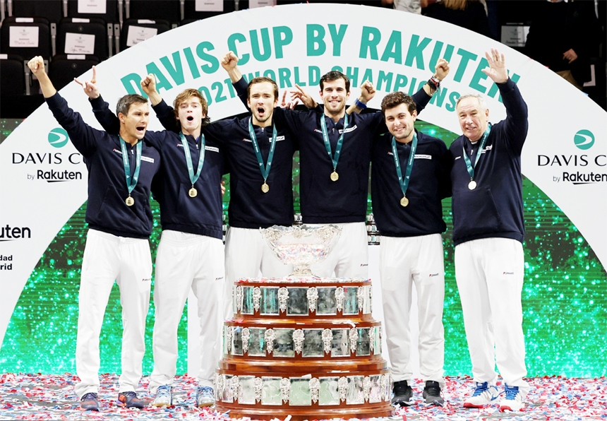 Players of Russia celebrate with the trophy after winning the Davis Cup tennis tournament at the Madrid arena in Madrid on Sunday.