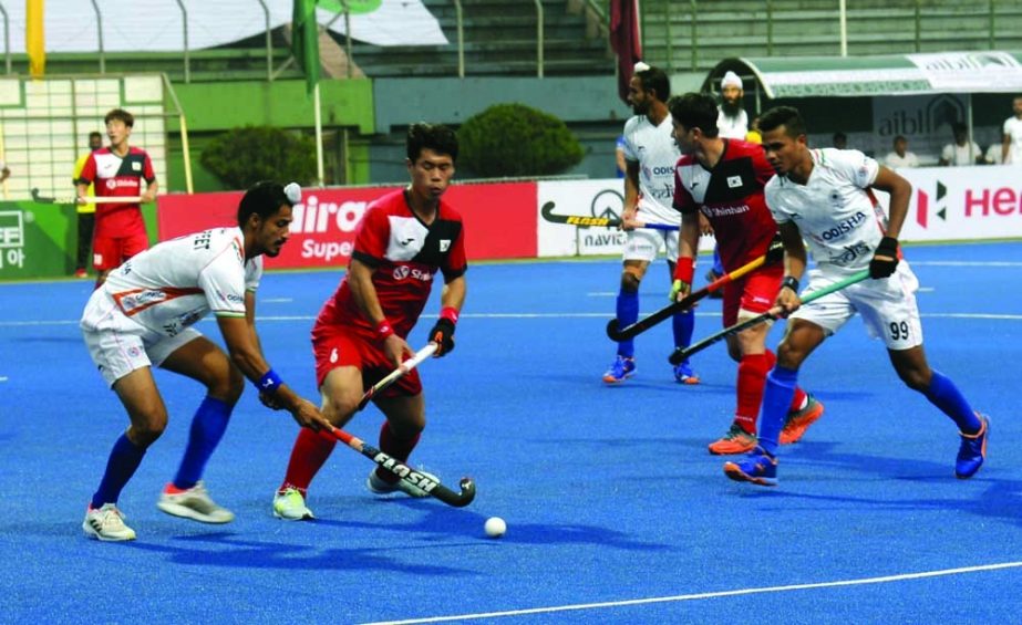 An action from the match of the Asian Champions Trophy men's hockey tournament between India and South Korea at the Maulana Bhashani National Hockey Stadium on Tuesday. Moin Ahamed