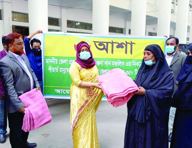 CHANDPUR: On behalf of ASA, Chandpur Deputy Commissioner Anjana Khan Majlish distributes 300 pieces of blankets among the cold hit poor and destitute people at the premises of DC Office on Wednesday.