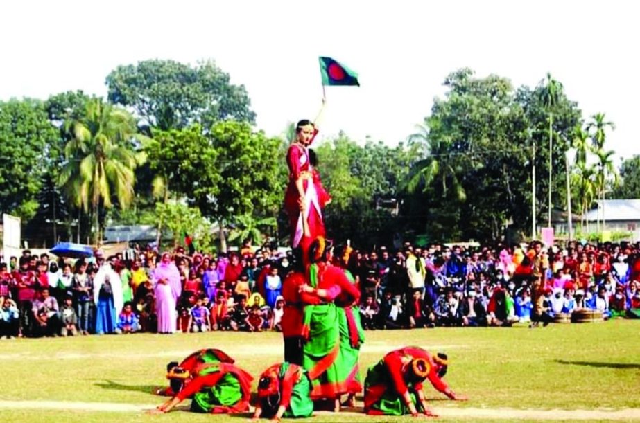 SARISHABARI (Mymensingh): Students of Sarishabari Salema Khatun Girls High School made a "Victory Jubilee Tower"" at the display at Sarishabari College on the occasion of the Golden of Jubilee Victory Day on Thursday. NN photo"