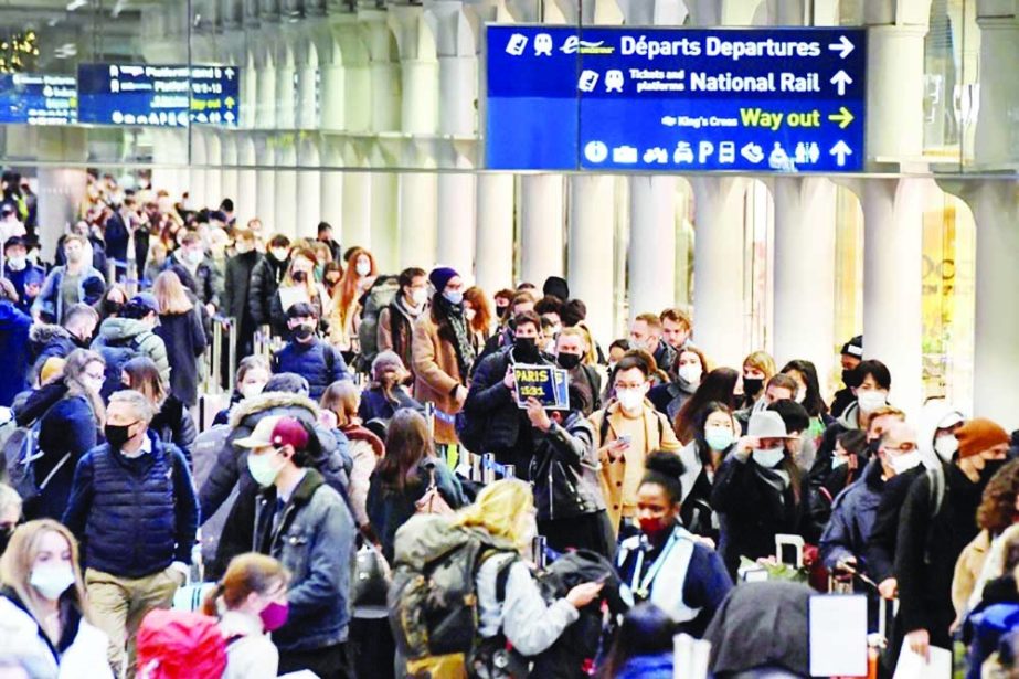 Passengers queue to board Eurostar trains at St Pancras International Station, ahead of increased restrictions for travellers to France from Britain. Agency photo