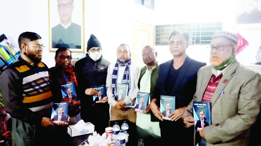 MELANDAH (Jamalpur) : Guests at the cover unwrapping ceremony of a book titled 'Onnorakam Jalal Uddin' by poet Habibur Rahman at Ma Shopping Mall Complex on Saturday.