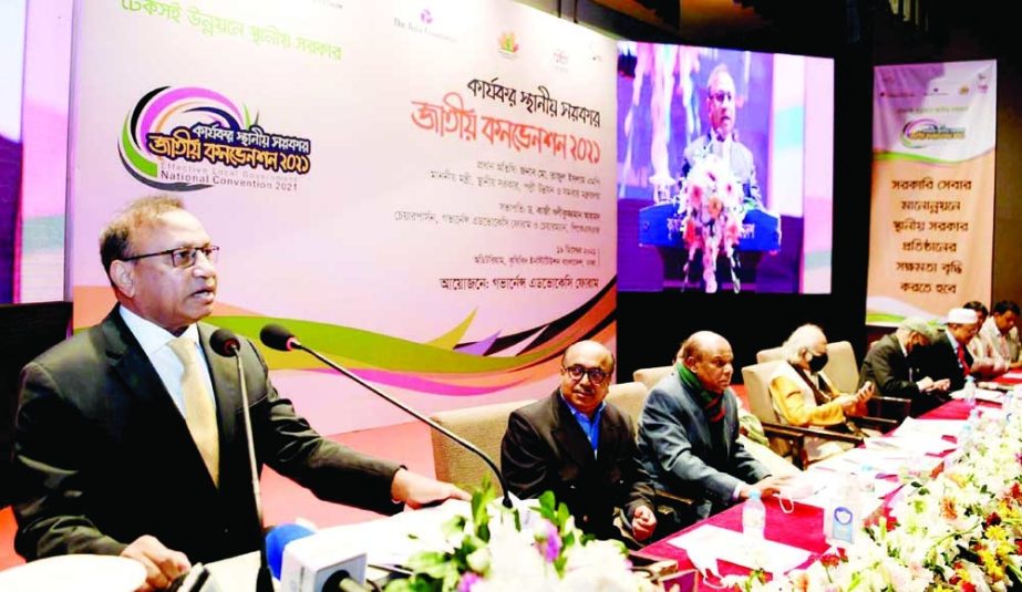Local Government Minister Md Tajul Islam speaks as the chief guest at 'Efficacious Local Government National Convention -2021' at Krishibid Institution in the capital on Sunday. NN photo