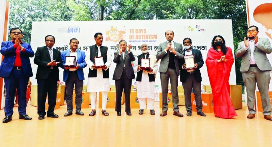 Law Minister Anisul Haque, among others , at a ceremony in observance of Sixteen Days of Activism at Justice Shahabuddin Ahmed Park in the city's Gulshan-2 on Wednesday. NN photo