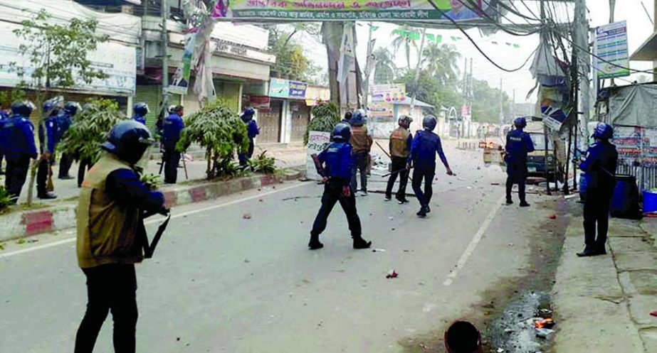 Clash between law-enforcers and BNP workers near the party office at Shaistanagar in Habiganj on Wednesday. NN photo