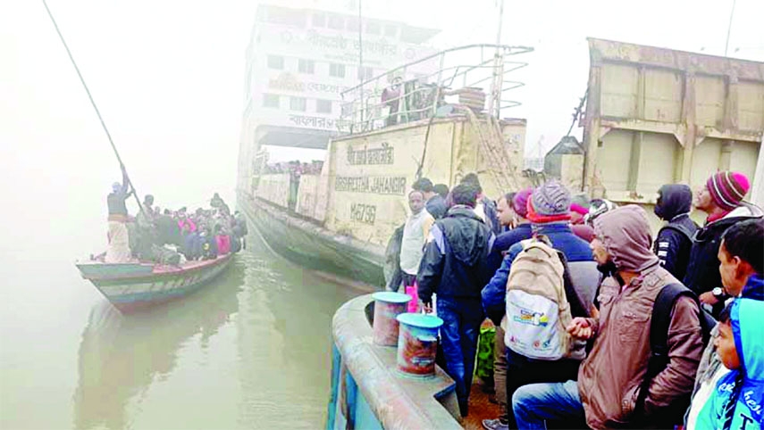 Thick fog disrupts ferry communication on different routes on Thursday resulting in long tailbacks on both sides of the rivers. This photo was taken from Daulatdia ghat yesterday.