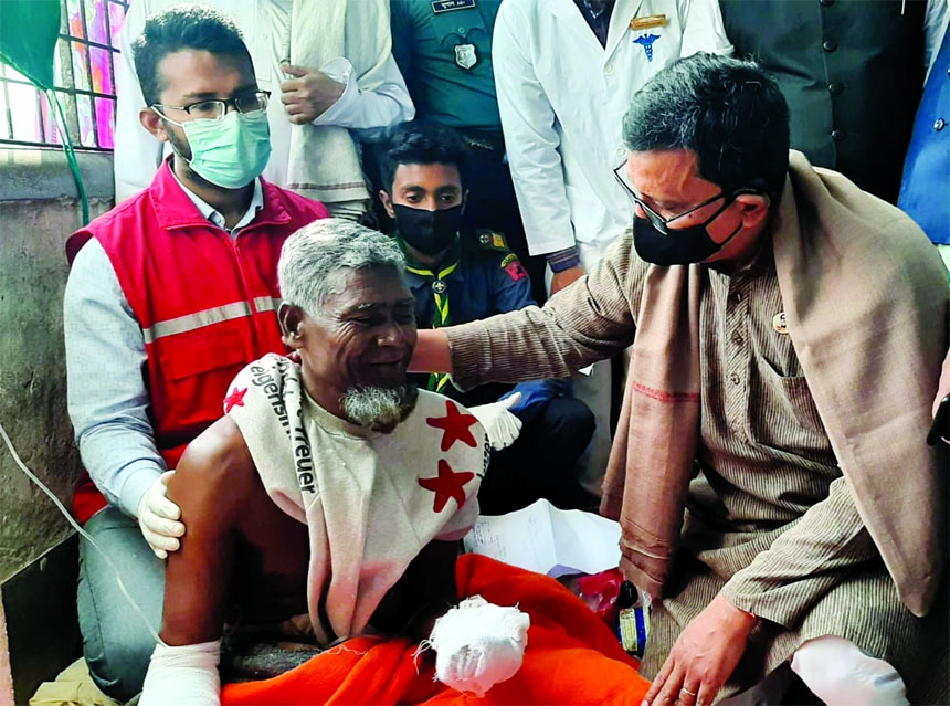 State Minister for Shipping Khalid Mahmud Chowdhury visits persons wounded in the fire incidents of MV Avijan-10 in Jhalakathi at Barisal Sher-e-Bangla Medical College Hospital on Friday.