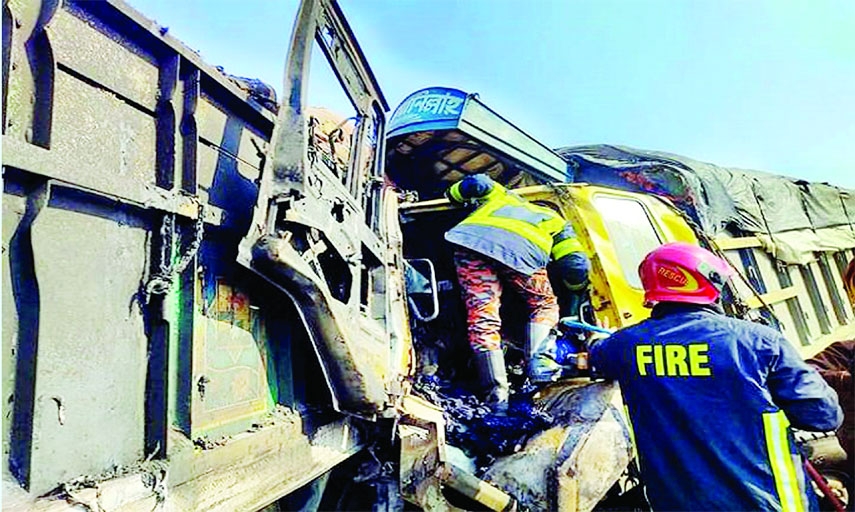 Fire Service members conduct rescue operation as two trucks collided head-on at Kalihati Upazila in Tangail eventually the engine caught fire leaving the driver critically burnt.
