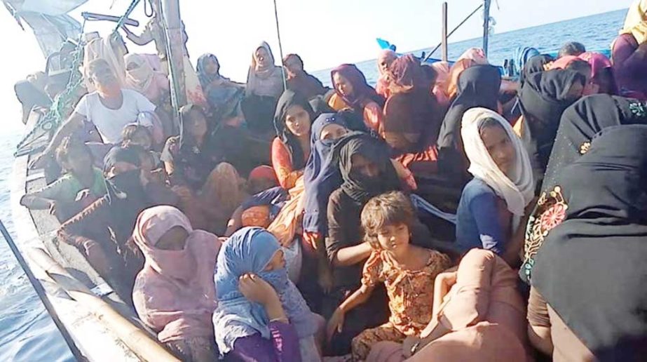 Dozens of Rohingya refugees on boat being sent back to Malaysian waters after intercepted near the coast of Indonesia's Aceh province. Agency photo
