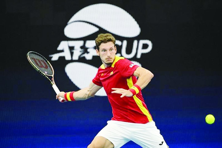 Pablo Carreno Busta of Spain hits a return against Alejandro Tabilo of Chile on day one of the 2022 ATP Cup tie between Chile and Spain in Sydney on Saturday.