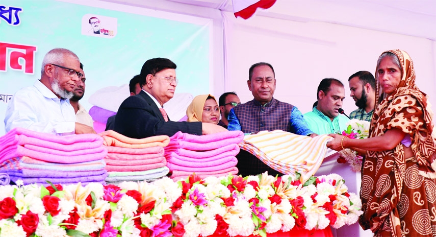 SYLHET: Foreign Minister A K Abdul Momen MP distributes winter clothes at Nagar Bhaban premises organised by Sylhet City Corporation on Saturday.