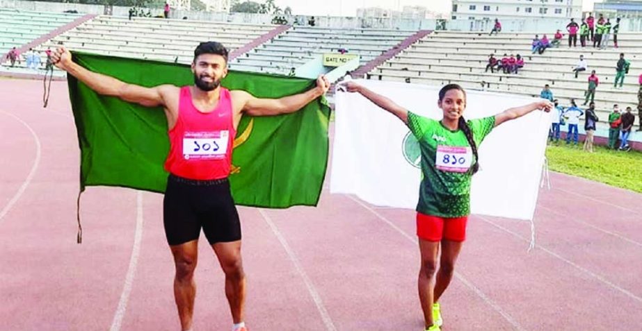 Imranur Rahman (left) of Bangladesh Army and Sumaiya Dewan of BKSP celebrating after becoming the fastest man and woman respectively at the Bangladesh Army Stadium in the city's Banani on Monday. Agency photo