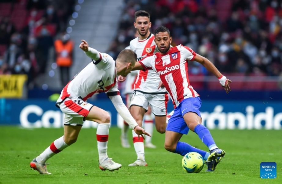 Atletico de Madrid's Renan Lodi (right) competes during a Spanish first division league football match between Atletico de Madrid and Rayo Vallecano in Madrid, Spain on Sunday. Agency photo