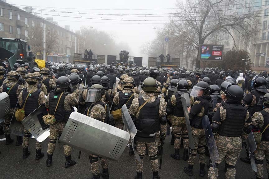 iot police block a street to prevent demonstrators during a protest in Almaty, Kazakhstan, Wednesday, Jan. 5, 2022.