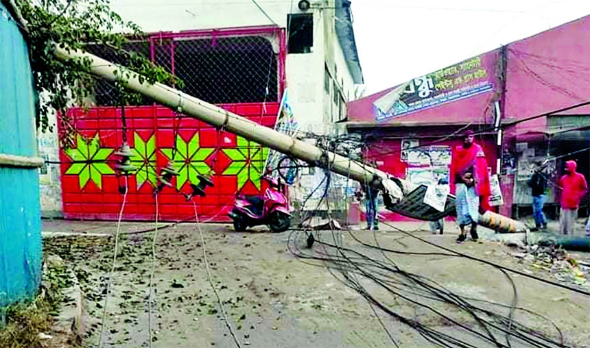 An electric pole broke down on the road at Delpara area in the capital on Friday as a speedy covered van dashed it on Friday morning. Though there was no casualty, but power supply remained suspended.