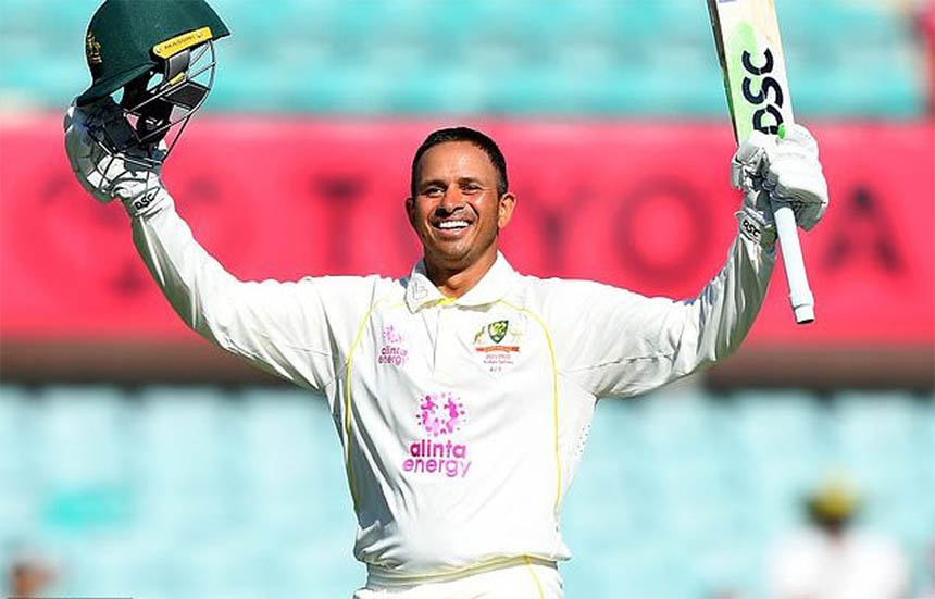 Australia's Usman Khawaja celebrates reaching his century on day four of the fourth Ashes cricket test between Australia and England at the Sydney Cricket Ground (SCG) on Saturday.