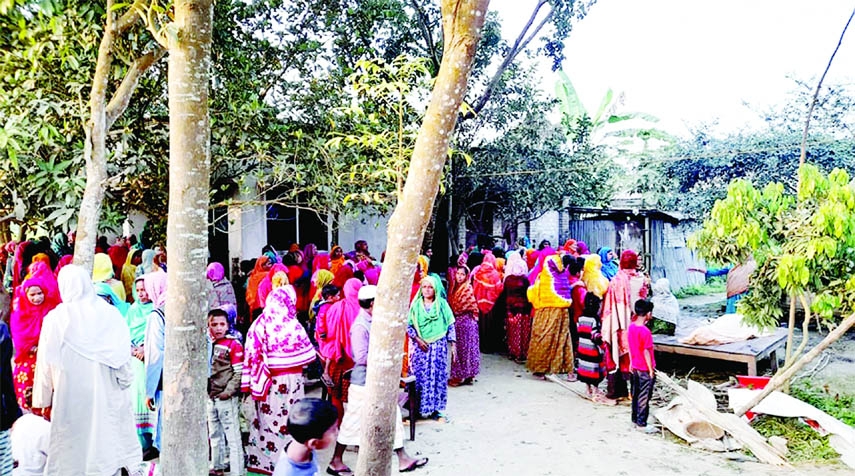 ISHWARDI (Pabna): Neighbours and relatives wail at the house of the mother and son killed in Ishwardi road accident on Thursday.