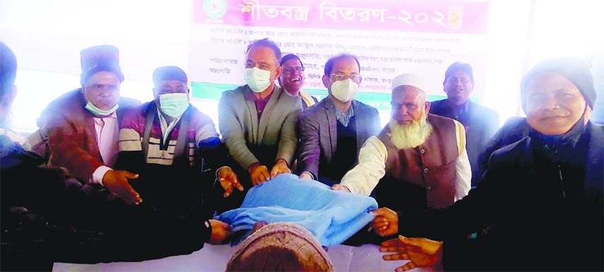 RANGPUR: Blankets distribute among the orphans, poor and distressed people at Rangpur Education Office Ground organised by Ujjivan, Rangpur Branch, a health conscious social organization on Friday morning.