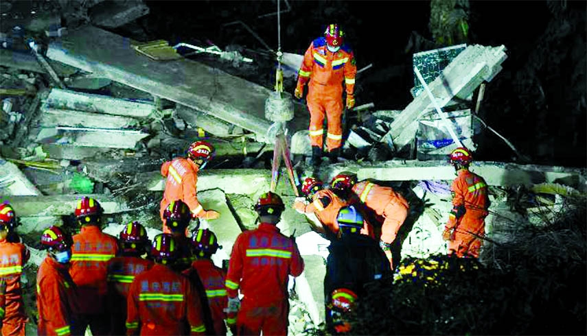 Firefighters search for survivors in the rubble of a collapsed canteen in Chongqing in China's southwest on Saturday.