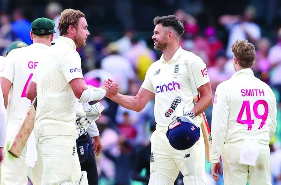 Stuart Broad (left) and James Anderson shake hands after helping England draw the fourth Ashes Test against Australia in Sydney on Sunday. Agency photo