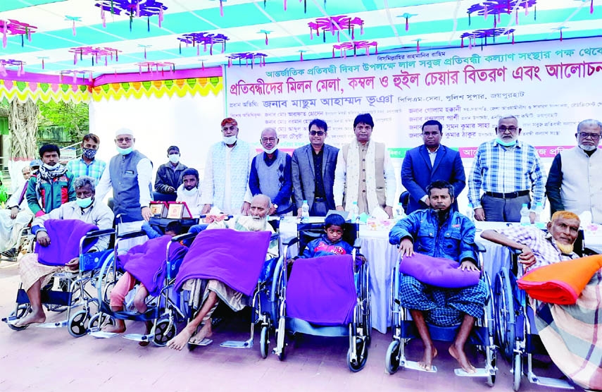 JOYPURHAT: Wheelchairs and blankets distribute among the disabled persons at Abul Kasem field in Joypurhat organised by Lal Sojub Protibondhi Sangtha on Saturday.