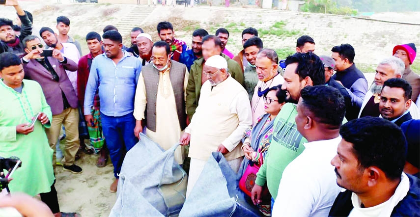 ISHWARDI(Pabna): Alhaj Nuruzzaman Biswas MP inaugurates the sand-filled geo-bag dumping work to protect dam from Madma River erosion on Friday.