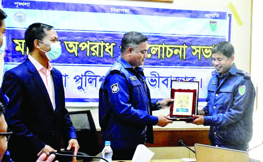 MOULVIBAZAR: Mohammad Zakaria, SP of Moulvibazar gives award to Md Ziaur Rahman Additional Superintendent of Police Sadar Circle as the best Police officer of Moulvibazar District for the consecutive fourth times at a programme in Moulvibazar recently.