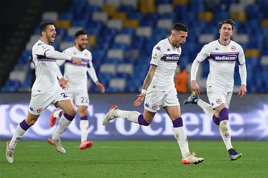 Fiorentina players celebrate their second goal during their Coppa Italia clash with Napoli at Stadio Diego Armando Maradona in Naples, Italy on Thursday.