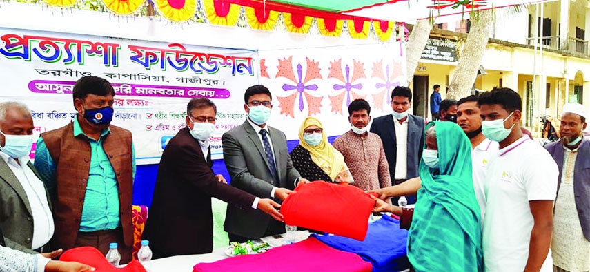 KAPASIA (Gazipur) : Cash and blankets distributed to various religious institutions and needy people in Kapasia upazila organised by Prottasha Foundation recently. AKM Golam Morshed Khan, UNO, Kapasia Upazila was present there as the Chief Guest.