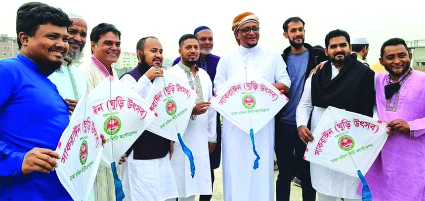 Councilor of 31 No. Ward of DSCC Sheikh Md. Alamgir inaugurates kite flying on roofs of buildings marking the Shakrain Festival. The snap was taken from the city's Becharam Dewri area on Friday.