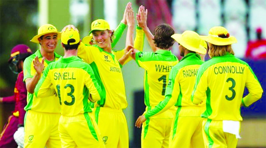 Players of Australia U-19 celebrate after taking a wicket against West Indies U-19 on Friday.