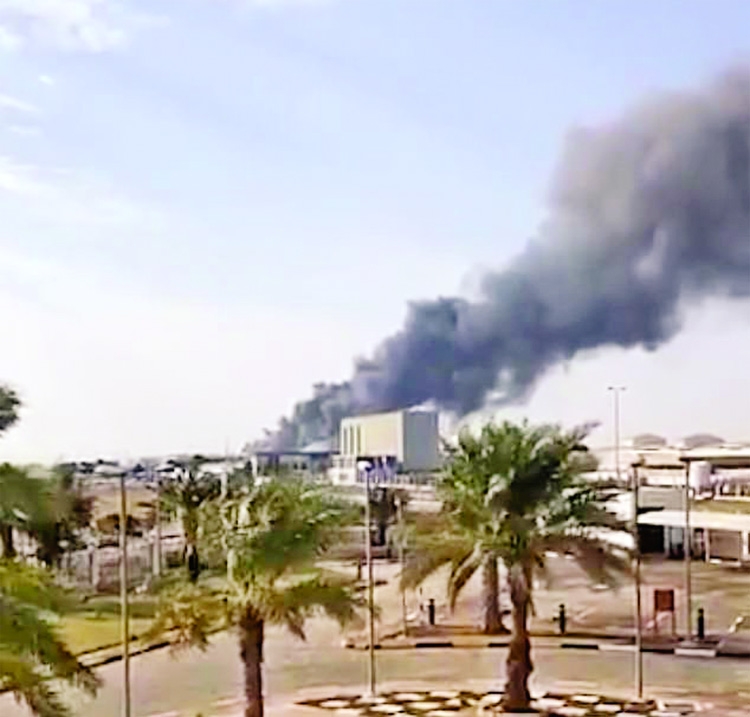 Black smoke billows up into the air following suspected drone attack in Abu Dhabi on Monday.